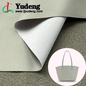 Material em couro PU cinza cimento para bolsas e malas (bolsas de mão, mochilas, malas de viagem)