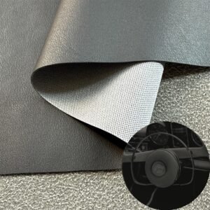Tela de cuero sintético negro en rollo para asientos de automóviles e interiores de automóviles.