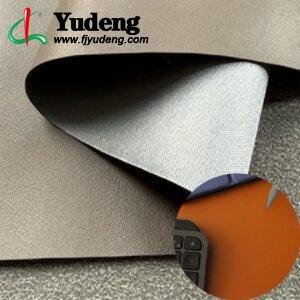 Material de cuero sintético PU marrón en rollo para protectores de escritorio y mesas.