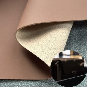 Piel sintética marrón de China. Material en rollo de piel sintética para bolsos y maletas (bolsos de mano, mochilas, maletas, etc.).