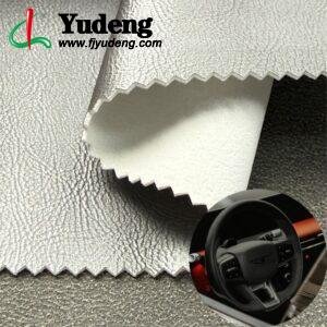 Rollo de cuero sintético PU plateado para asientos de automóviles e interiores de automóviles.