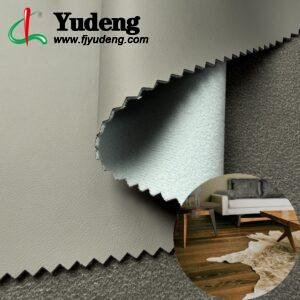 Rollo de piel sintética de poliuretano (PU) vegana gris para tapicería de muebles o decoración (sofás, camas, armarios, paredes interiores, etc.).
